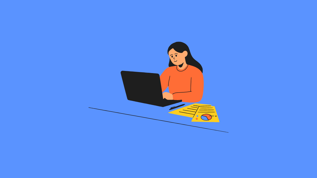A small business owner smiling at a laptop, using AI tools to streamline operations without a tech team.